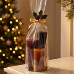 Lotus Kaarsen cadeauset kleurverloop warm: Wine Wood, Stone Red en Cognac in een cellofaan zakje met gouden lint